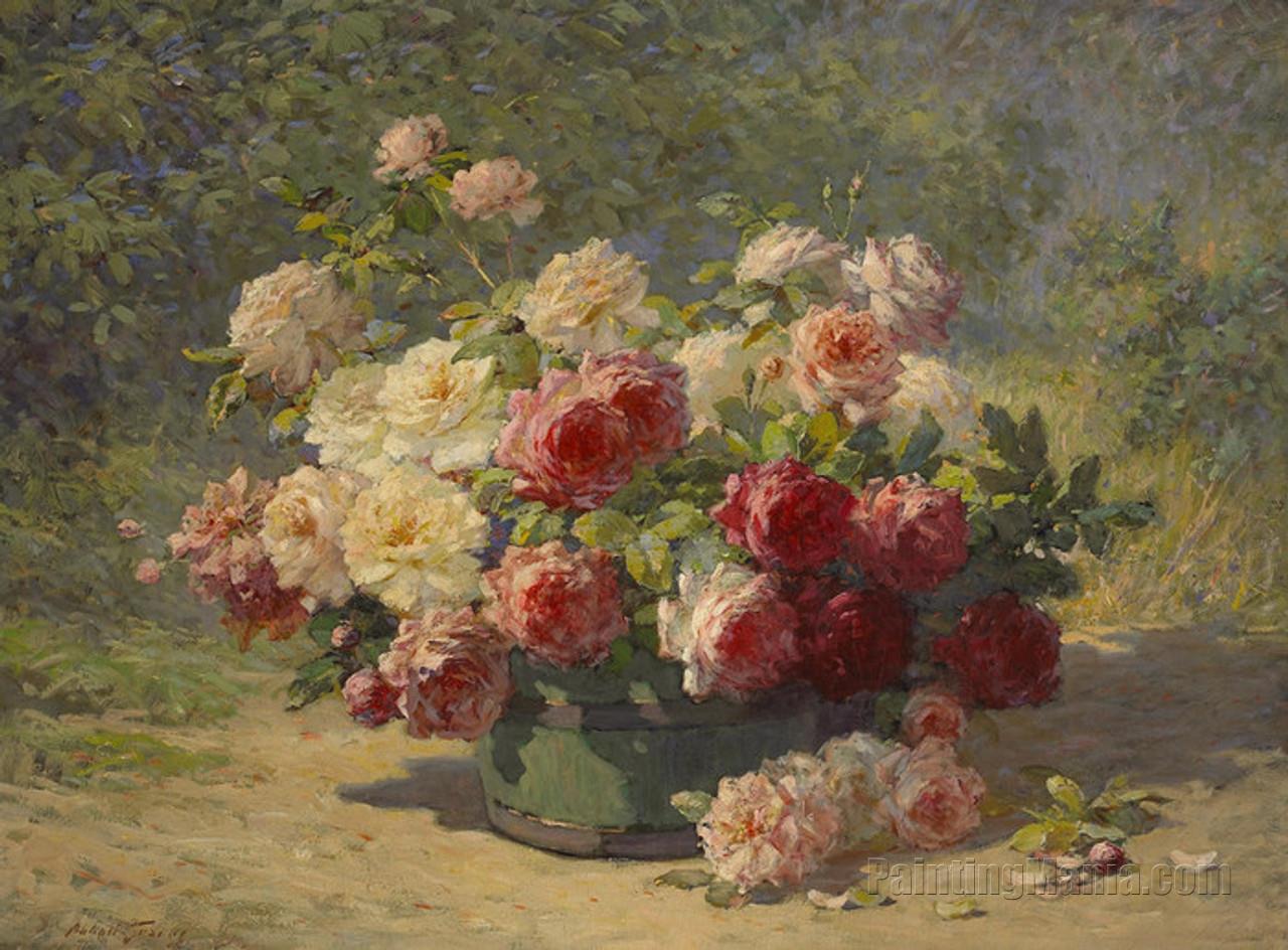 A Mixed Bouquet of Roses in a Green Barrel