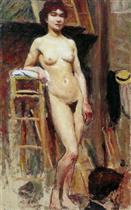 Naked woman Standing in a Workshop