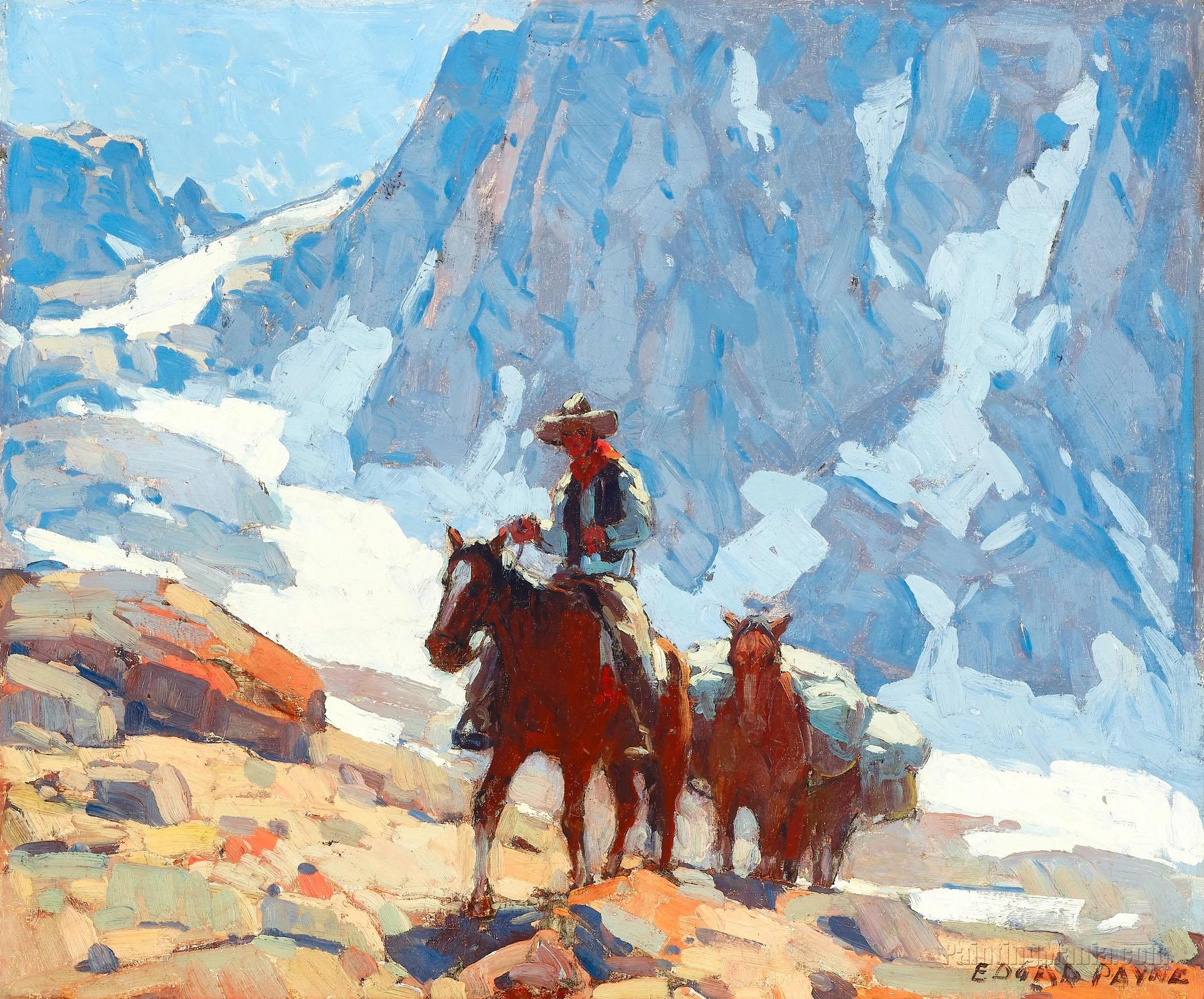 Rider and pack horse in the Sierras