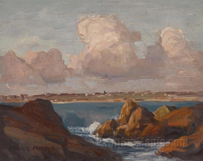 Rocky coastline with pink clouds above