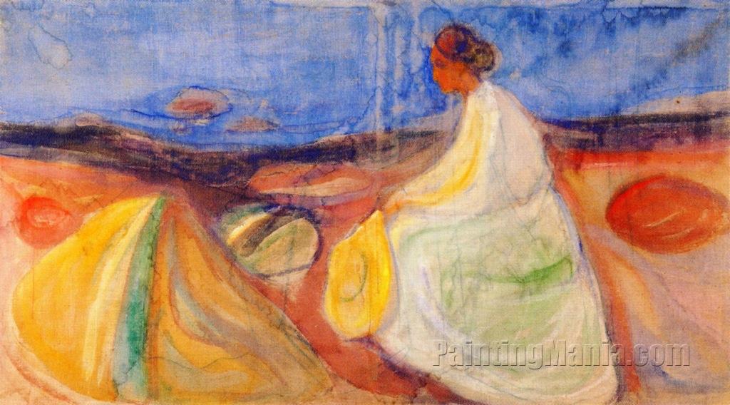 Woman in White Sitting on the Beach