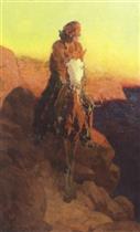 Native American on horseback on a cliff at sunset