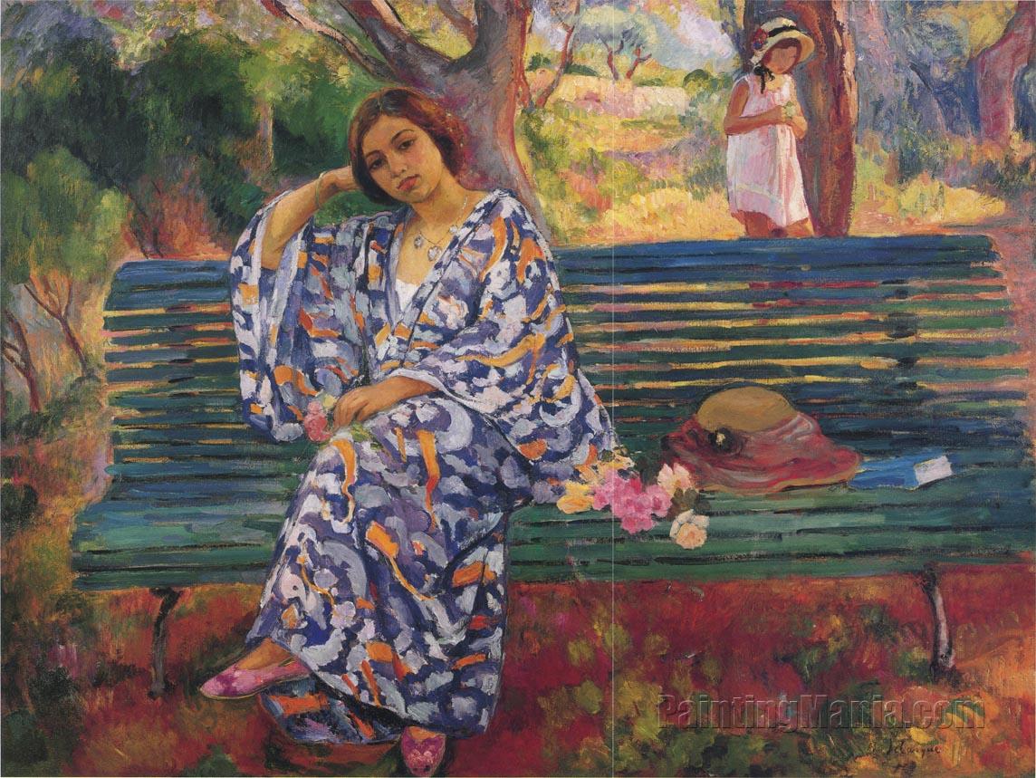 Young woman seated on a bench