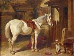 A Saddled Grey Pony and Dogs outside an Inn