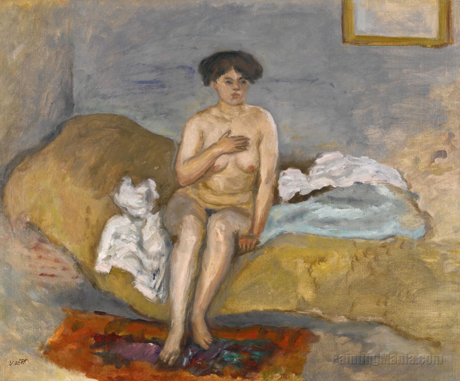 Naked Woman Sitting on a Couch
